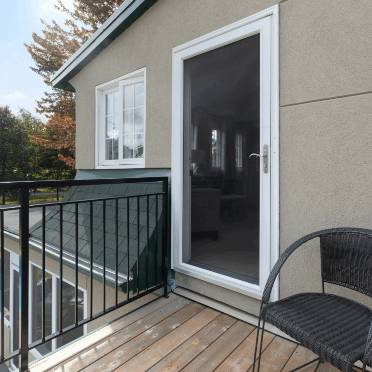 Minimalist Small Balcony with Black Chair and Wooden Deck