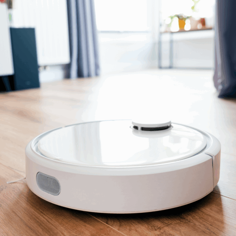 Smart robot vacuum navigating across a modern wooden floor in a bright living space.
