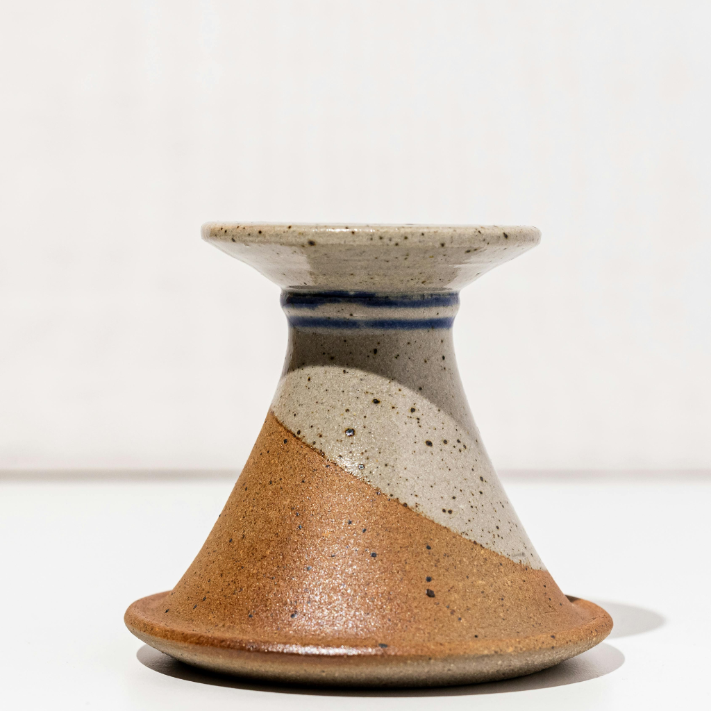 Two-tone handmade ceramic candle holder in earthy tones