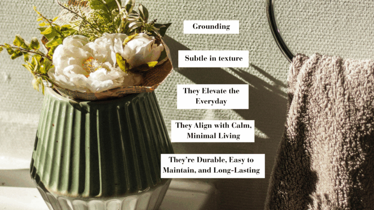 Green ceramic vase with white flowers on a bathroom sink beside a taupe towel, with text highlighting the benefits of the decor.