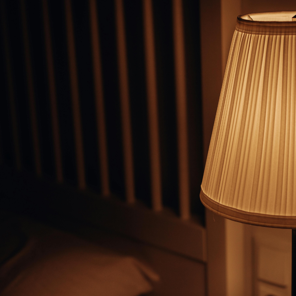 Dim overhead lights and switch to lamps