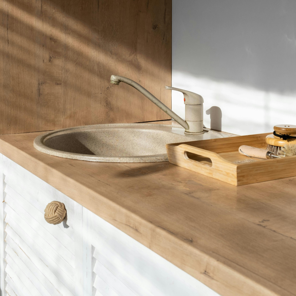 Load the dishwasher or empty the sink