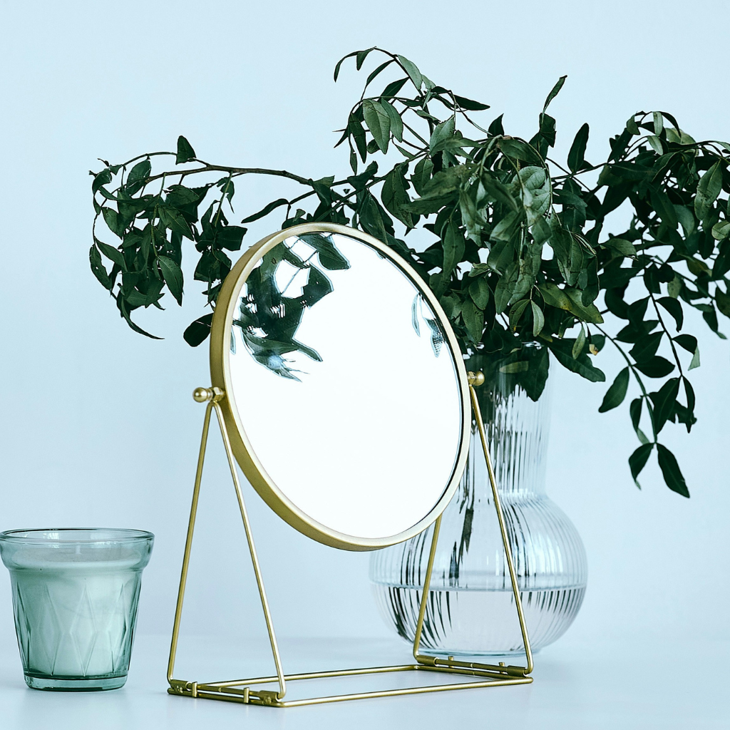 A small mirror or photo I face toward me when I need grounding