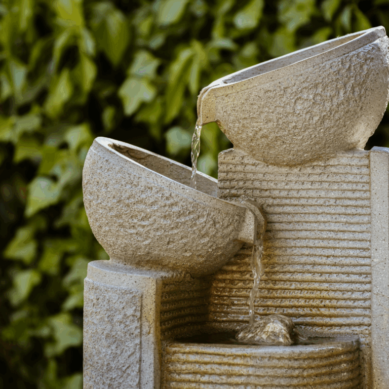 Tiered outdoor water fountain with textured ceramic bowls and flowing water