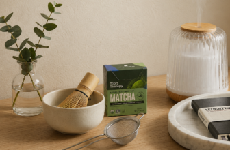 Quiet luxury Mother's Day gift flat lay with matcha set, Nécessaire body wash, Leuchtturm1917 journal, and ceramic diffuser.