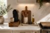 Styled minimalist kitchen countertop with a vertical coffee station, utensil crock, and corralled seasoning tray.